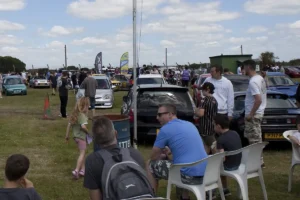 Showing the crowds relaxing at one of the car shows held on site.