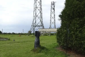 Image of a reproduction world war 2 bomb close to the original impact point on site.